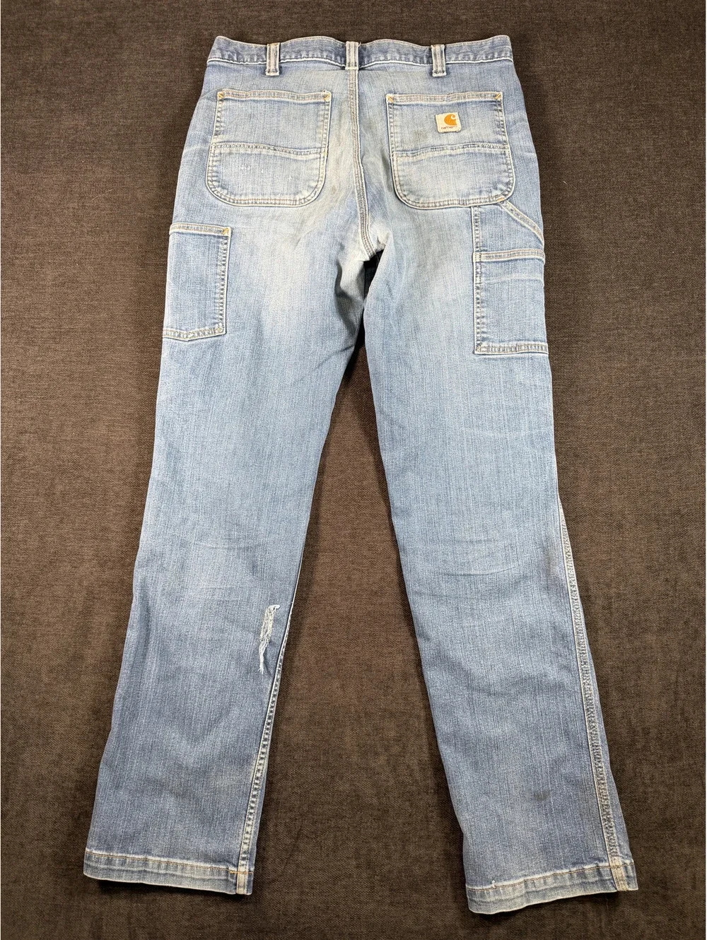 Carhartt Men's Light Blue Denim Work Jeans with Distressed Details, Size 34x34